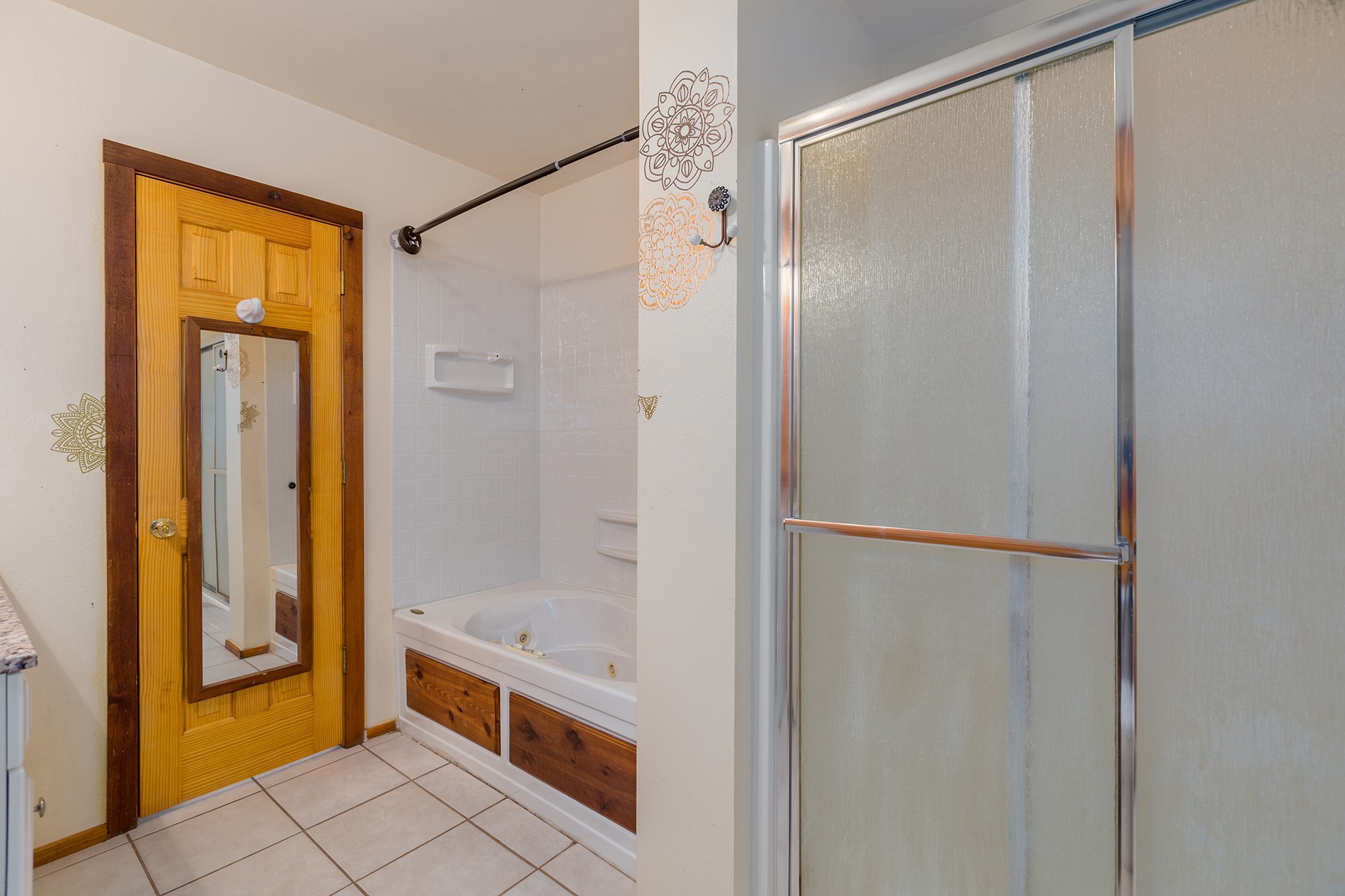 1152 Loving Road Lufkin, TX 75901 - Photo 20 of 42 a bathroom with a tub and a shower