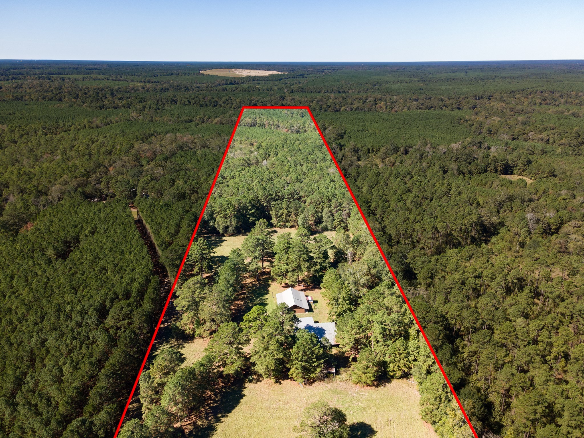 1152 Loving Road Lufkin, TX 75901 - Photo 2 of 42 an aerial view of residential houses with outdoor space