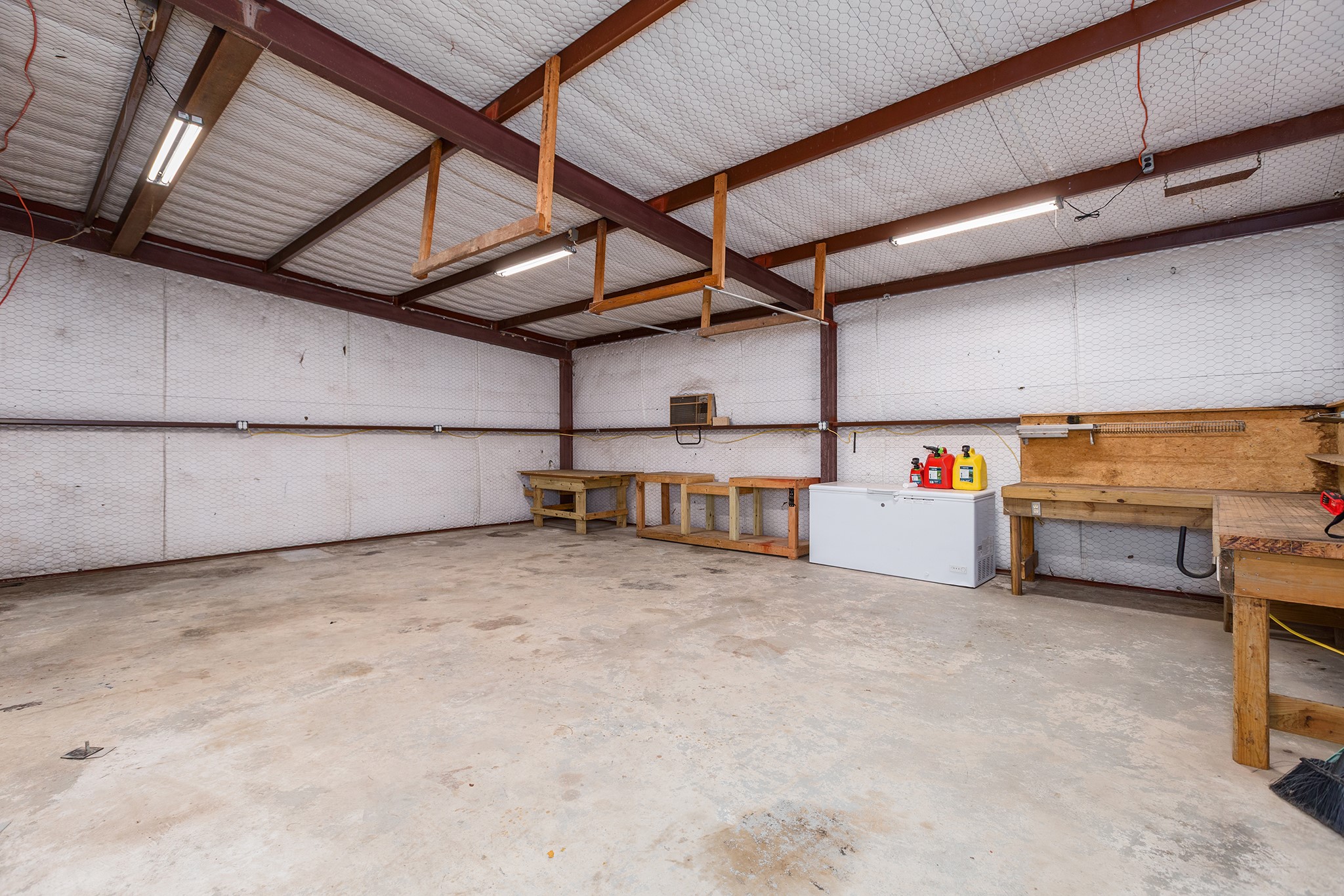 1152 Loving Road Lufkin, TX 75901 - Photo 27 of 42 a view of storage and utility room with racks