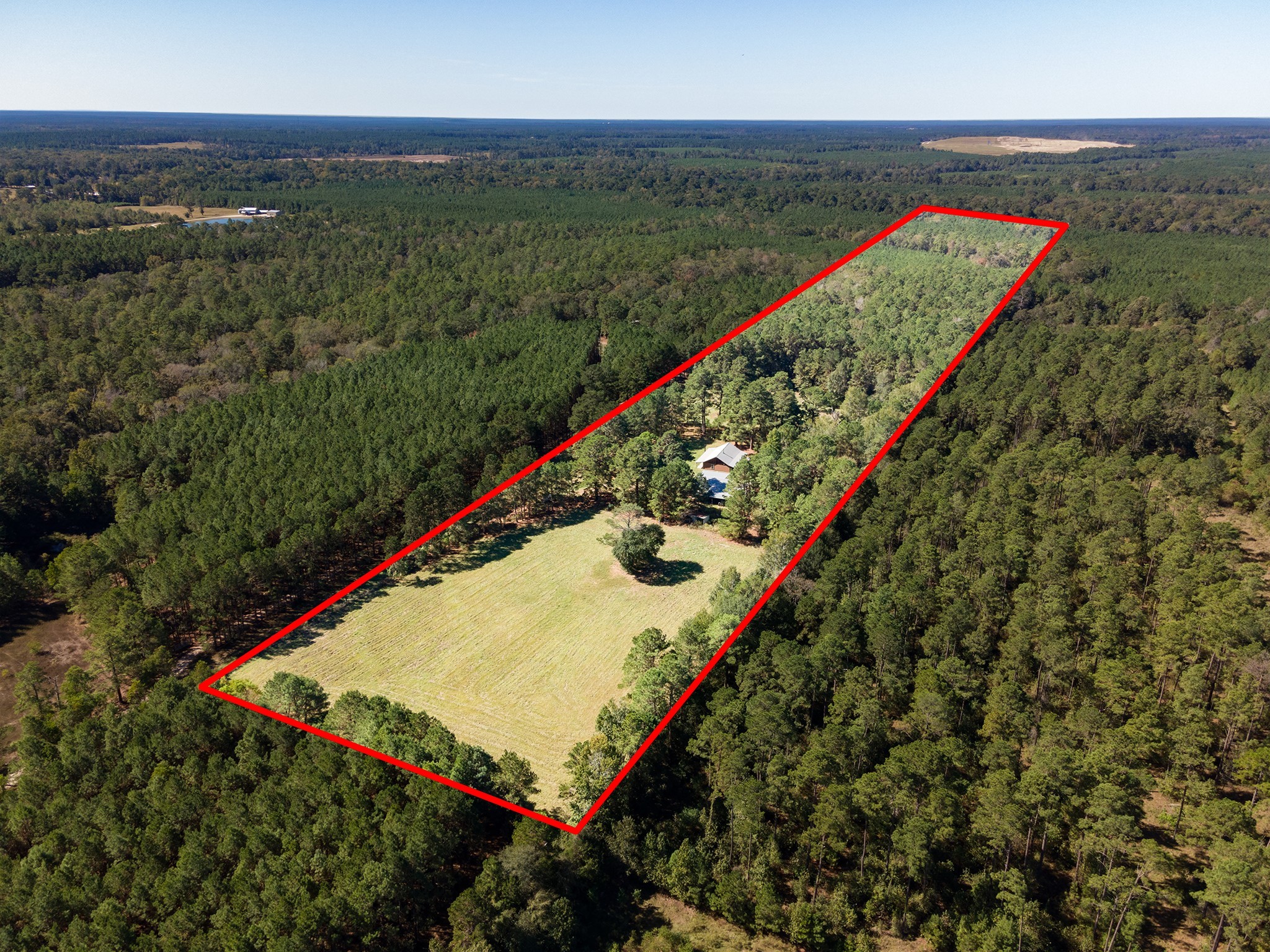 1152 Loving Road Lufkin, TX 75901 - Photo 35 of 42 an aerial view of a residential houses with outdoor space