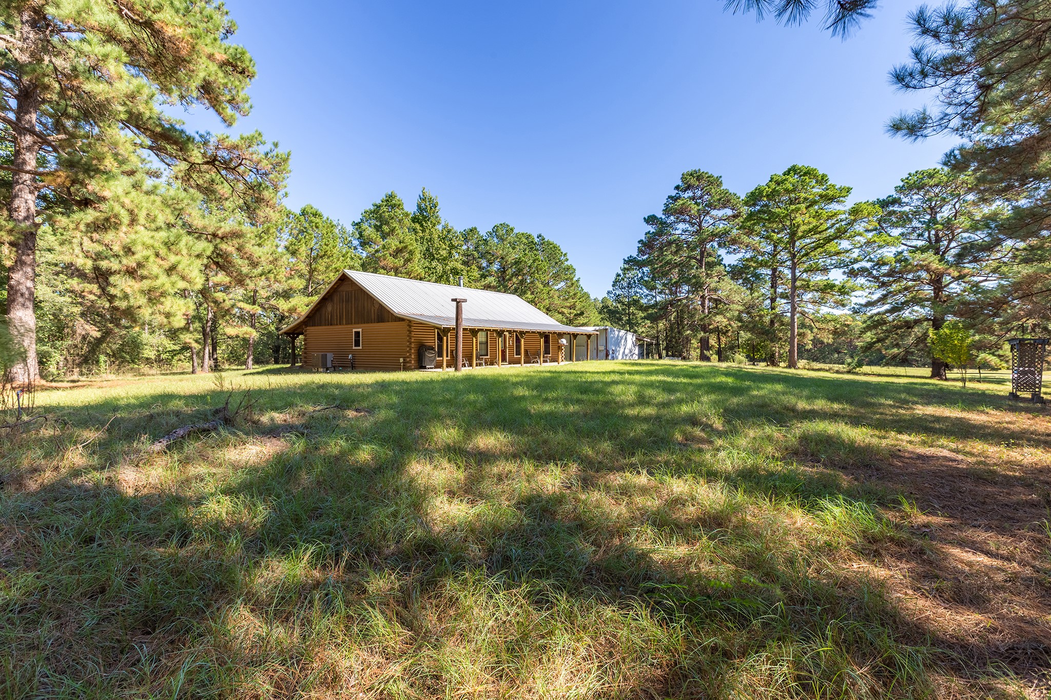 1152 Loving Road Lufkin, TX 75901 - Photo 40 of 42 a view of a house with a yard
