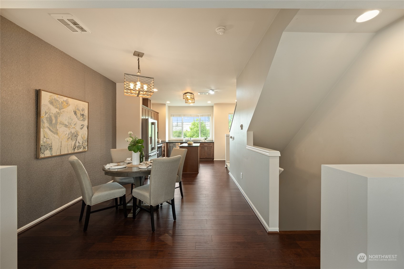 3312 31st Drive Everett, WA 98201 - Photo 11 of 27 a view of a dining room with furniture and wooden floor