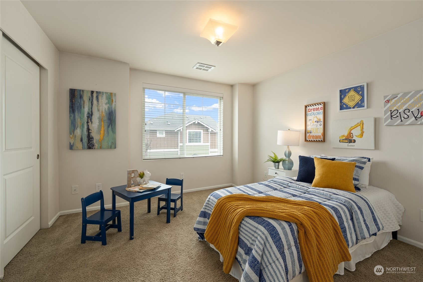 3312 31st Drive Everett, WA 98201 - Photo 16 of 27 a bedroom with bed and a window