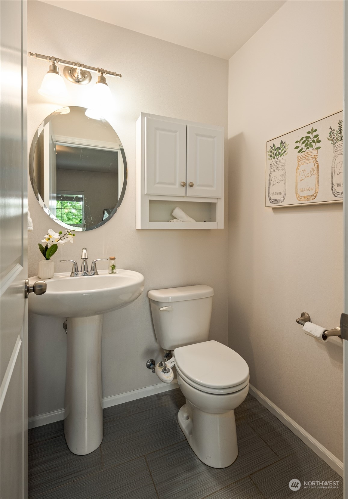 3312 31st Drive Everett, WA 98201 - Photo 22 of 27 a bathroom with a toilet sink and mirror