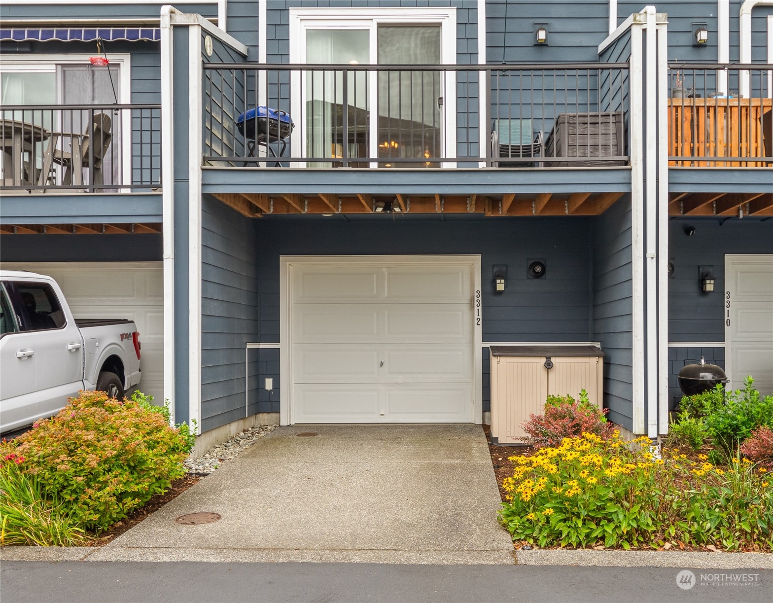 3312 31st Drive Everett, WA 98201 - Photo 25 of 27 a front view of a building with a garden