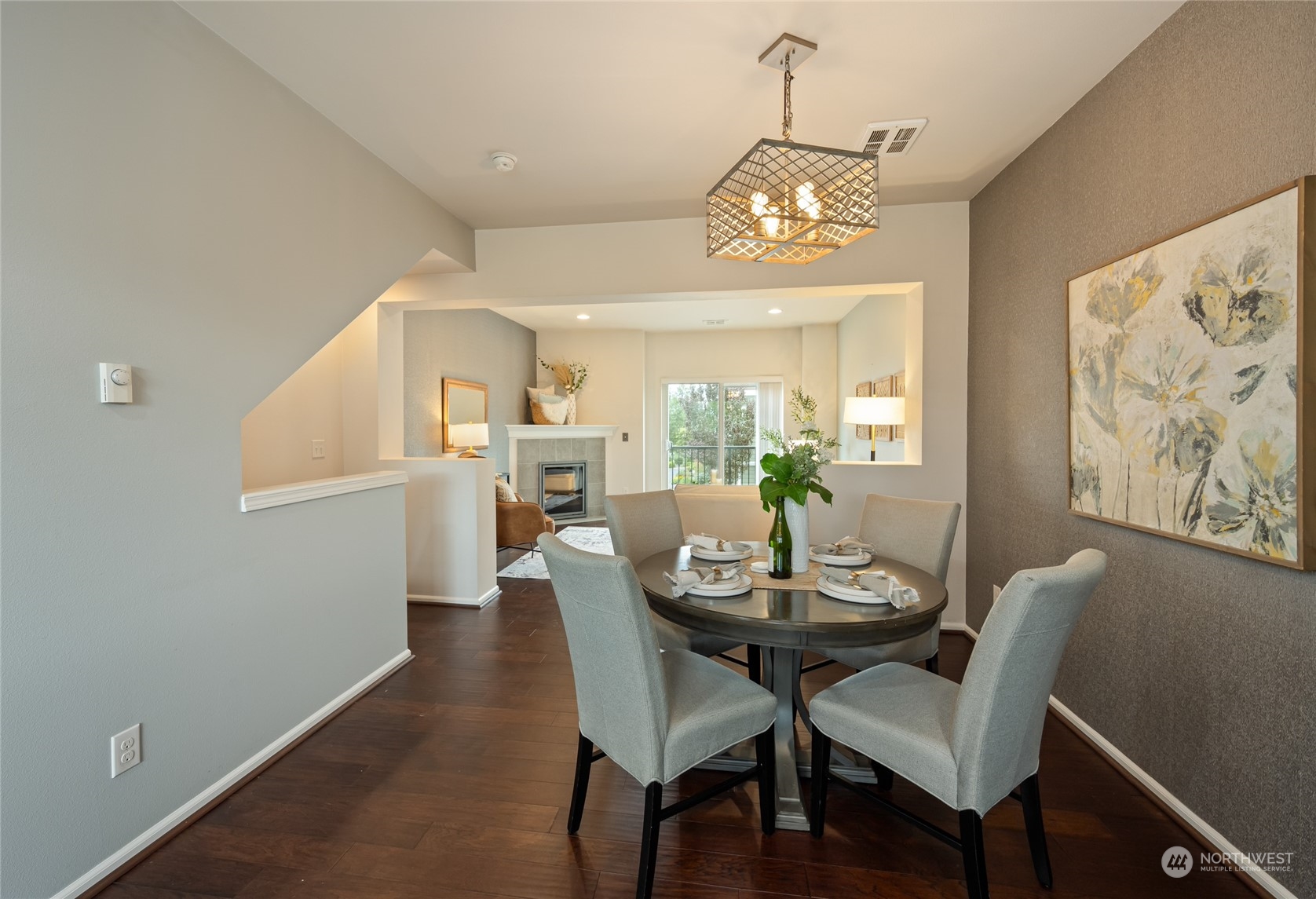3312 31st Drive Everett, WA 98201 - Photo 10 of 27 a view of a dining room with furniture and wooden floor