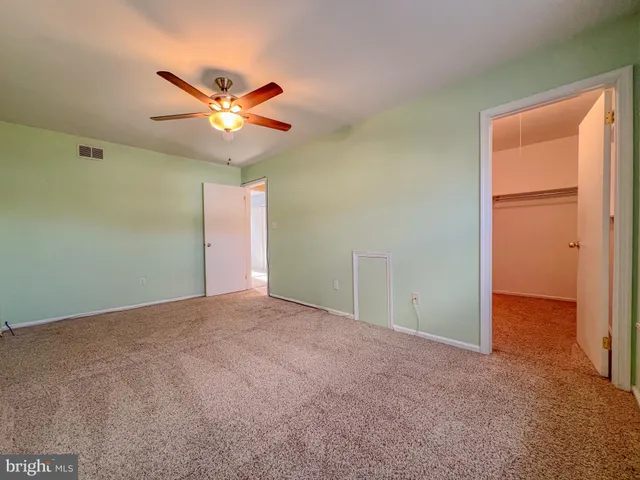 a view of a room with racks on the wall