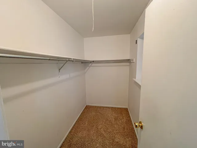 a view of a storage & utility room with washer and dryer
