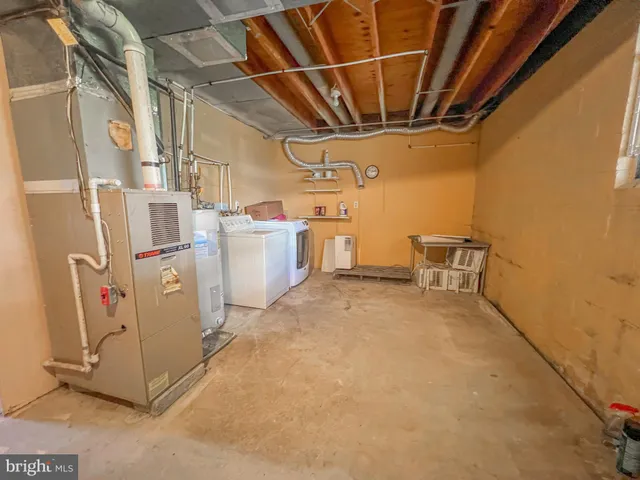 a view of a storage and utility room