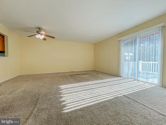 a large kitchen with stainless steel appliances granite countertop a stove a sink dishwasher and a refrigerator