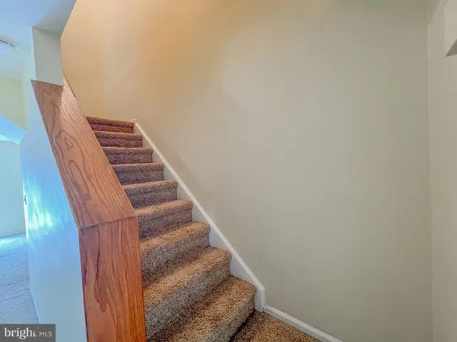 a view of empty room with windows