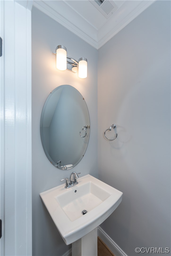1712 Old Brick Road, Unit 13A Henrico, VA 23233 - Photo 17 of 25 a bathroom with a sink and a mirror