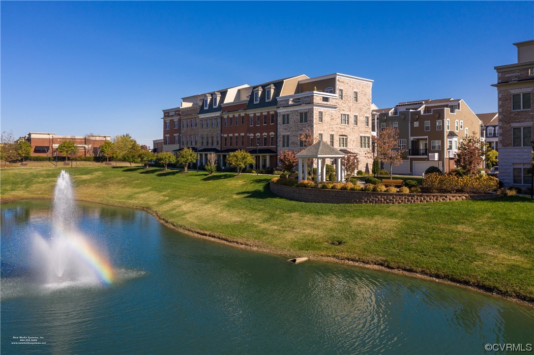 1712 Old Brick Road, Unit 13A Henrico, VA 23233 - Photo 23 of 25 a view of a house with a yard