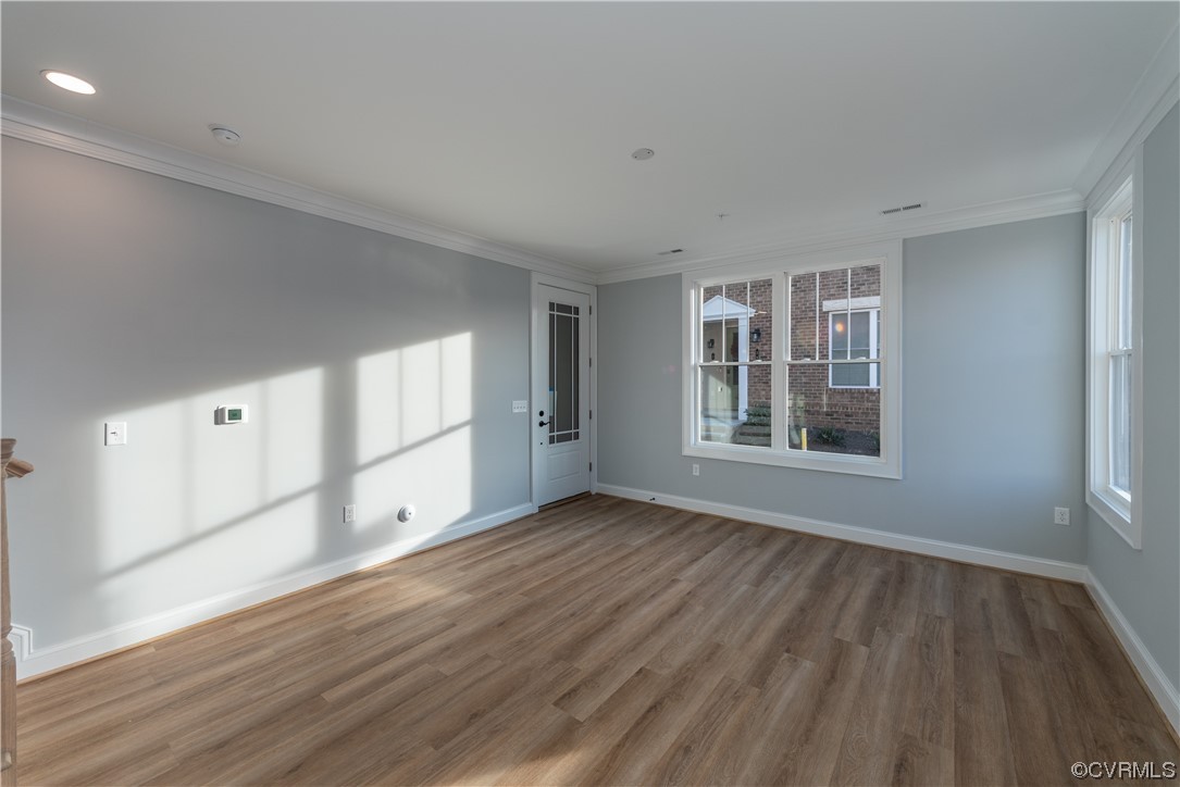 1712 Old Brick Road, Unit 13A Henrico, VA 23233 - Photo 8 of 25 wooden floor in an empty room with a window