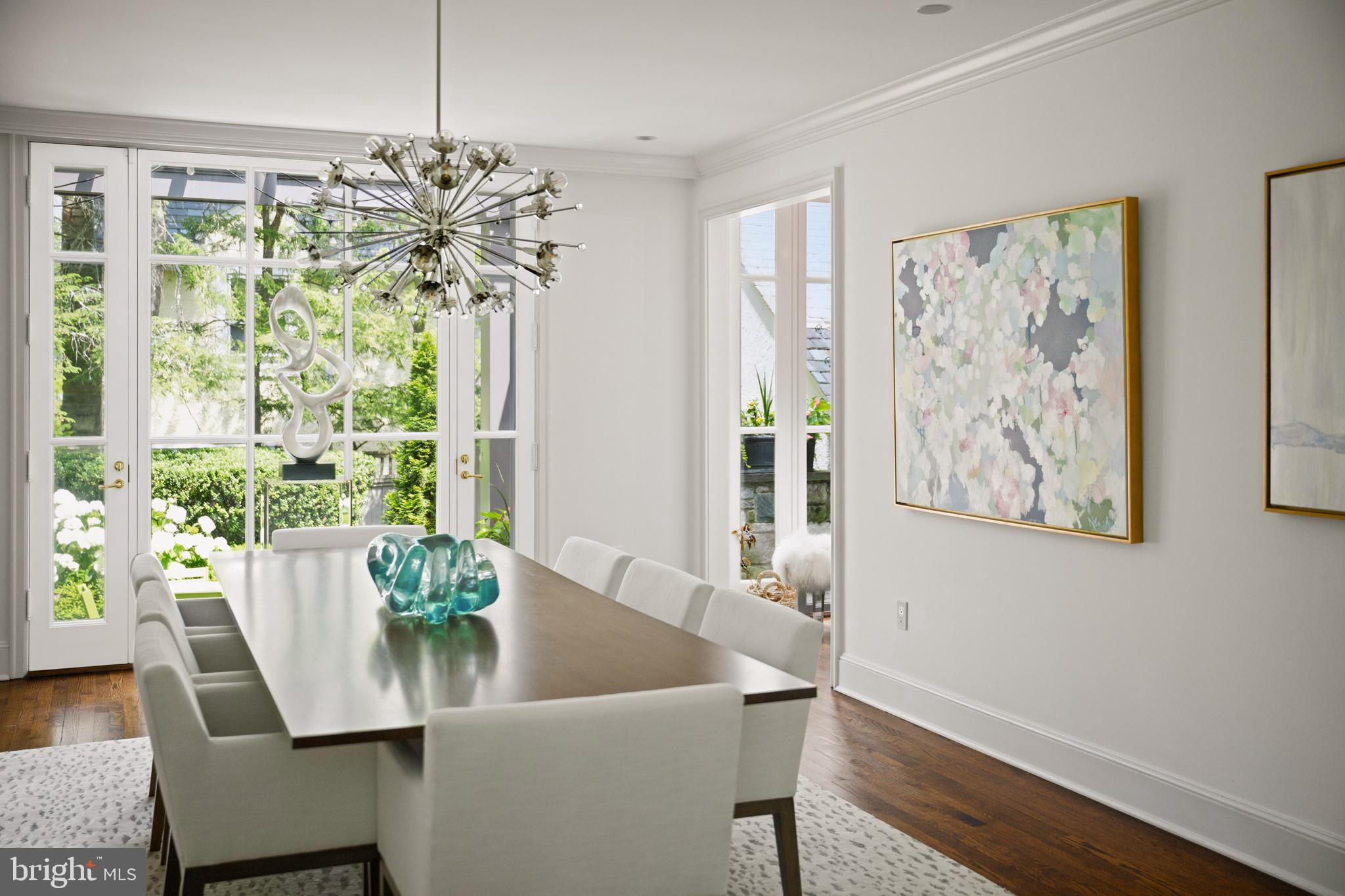 2931 Foxhall Road Northwest Washington, DC 20016 - Photo 6 of 62 a view of a dining room with furniture window and wooden floor