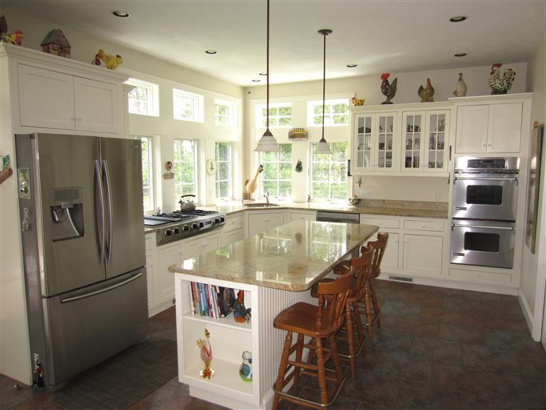 86 Howes Path Dennis, MA 02638 - Photo 13 of 30 a kitchen with stainless steel appliances granite countertop a refrigerator a sink a stove and a refrigerator