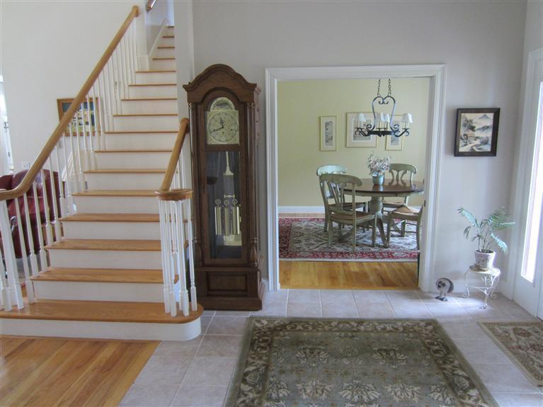 86 Howes Path Dennis, MA 02638 - Photo 19 of 30 a view of staircase with a rug and a chandelier