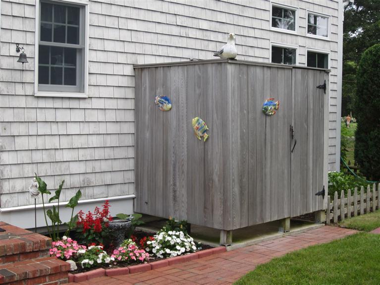 86 Howes Path Dennis, MA 02638 - Photo 26 of 30 a view of a wooden house with a yard