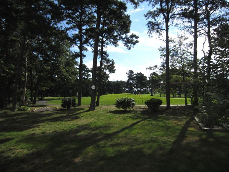 86 Howes Path Dennis, MA 02638 - Photo 4 of 30 a view of a park with large trees