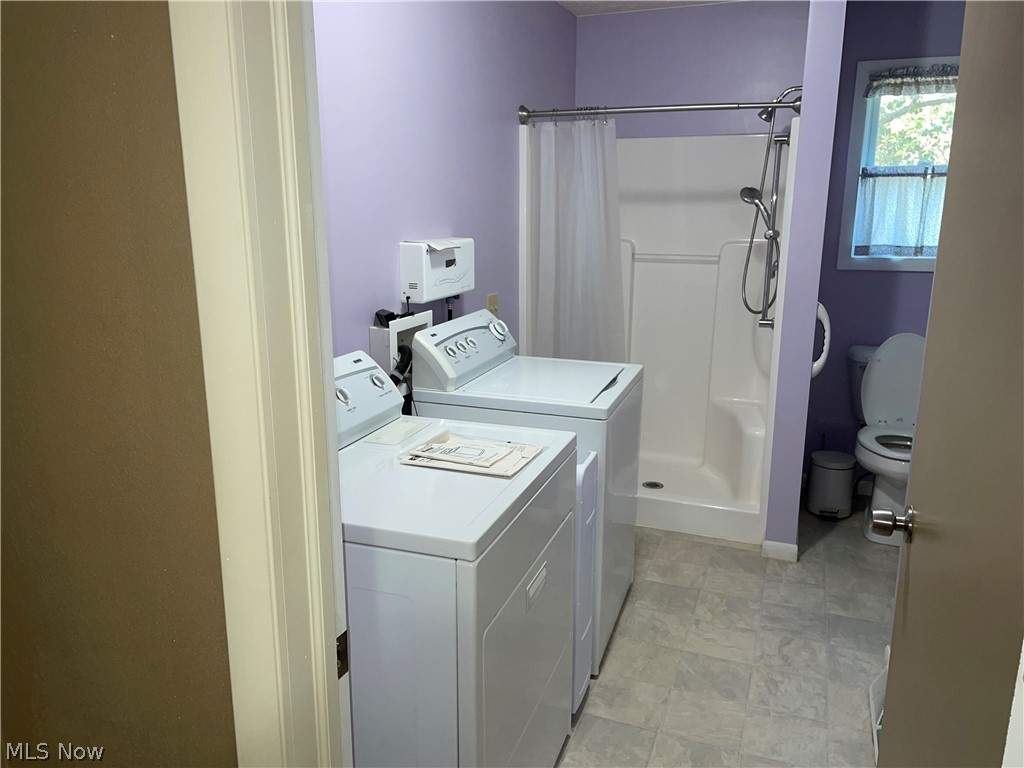 18368 Rowell Road Wellington, OH 44090 - Photo 16 of 32 master bath with walk-in tub and closet