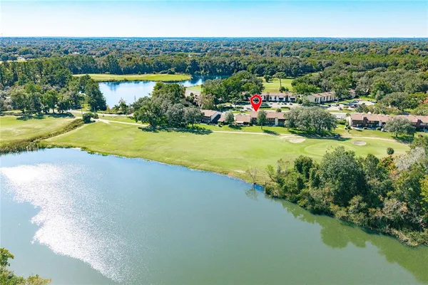 a view of a house with entryway and plants