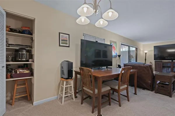 a bathroom with a toilet sink and vanity
