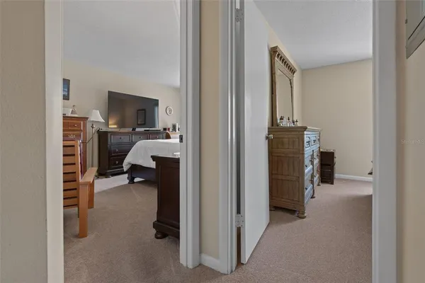 a view of a swimming pool with a patio