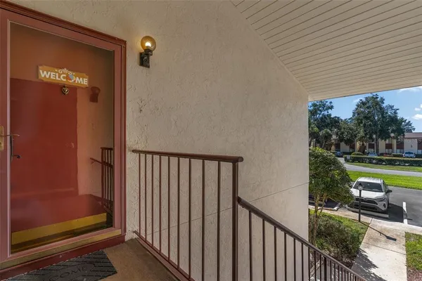 a kitchen with granite countertop a sink stainless steel appliances and cabinets