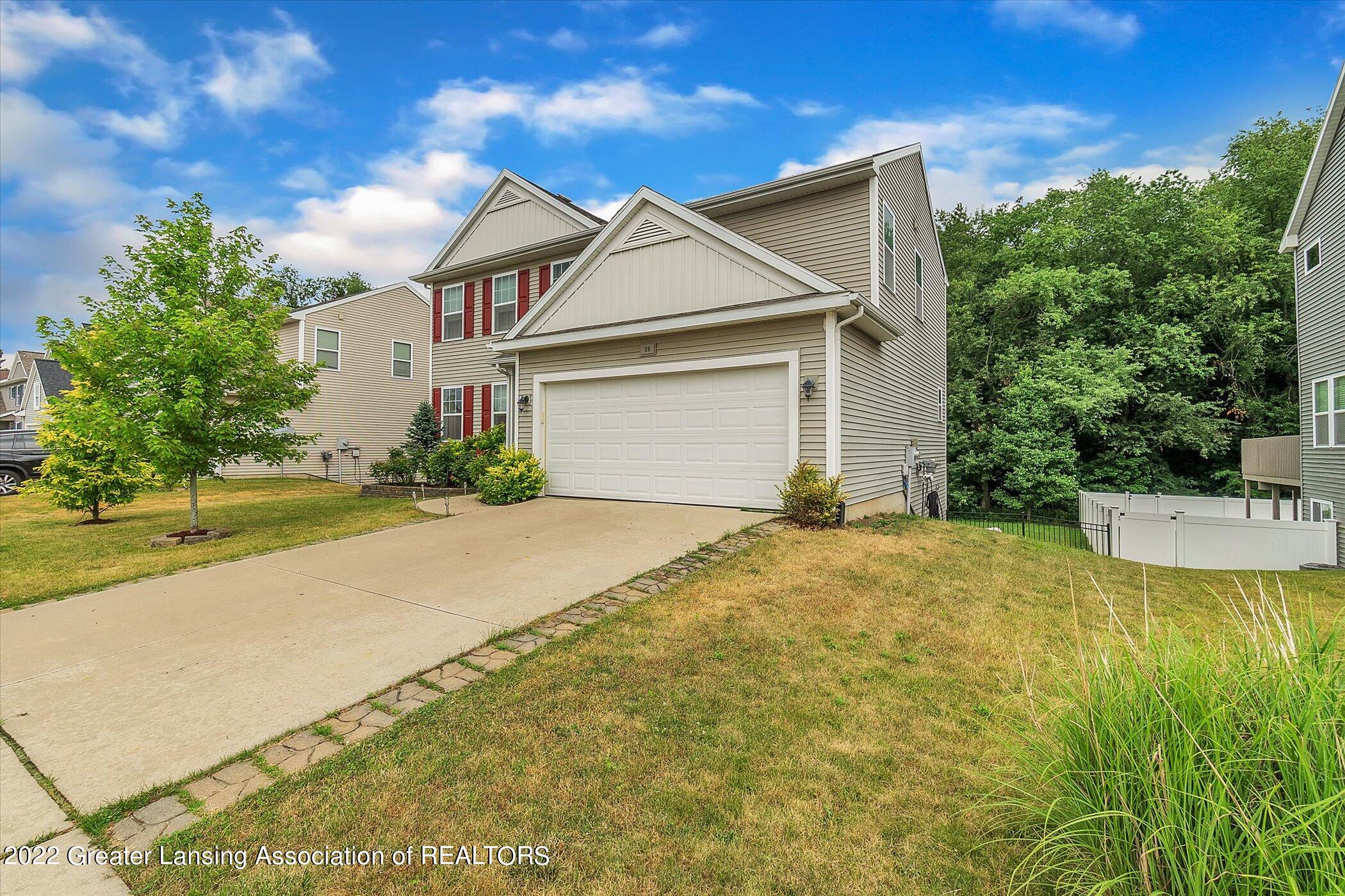 59 Lake Ridge Drive Mason, MI 48854 - Photo 4 of 51 04-59-Lake-Ridge-Dr-WindowStill-Real-Est