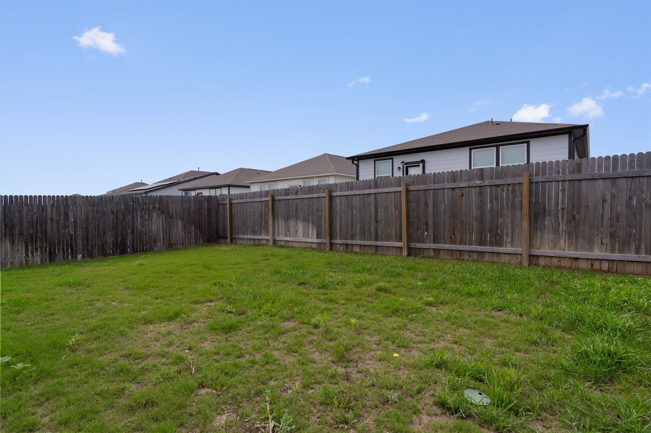 10613 Ridan Way Buda, TX 78610 - Photo 31 of 32 a view of a backyard