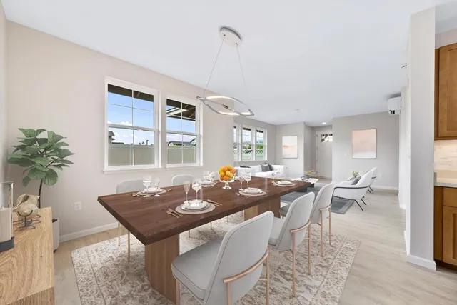 a view of a dining room with furniture