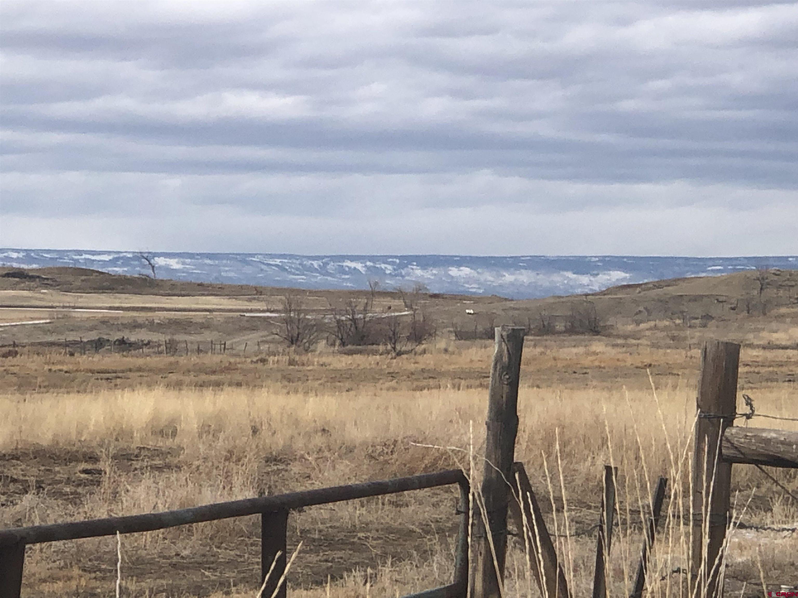 Tract A & 3 East Oak Grove Road Montrose, CO 81401 - Photo 5 of 11 a view of an ocean and beach
