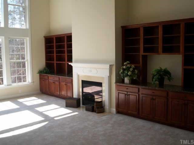 12800 Pegasi Way Raleigh, NC 27614 - Photo 4 of 5 Built-in cabinets in two story family room
