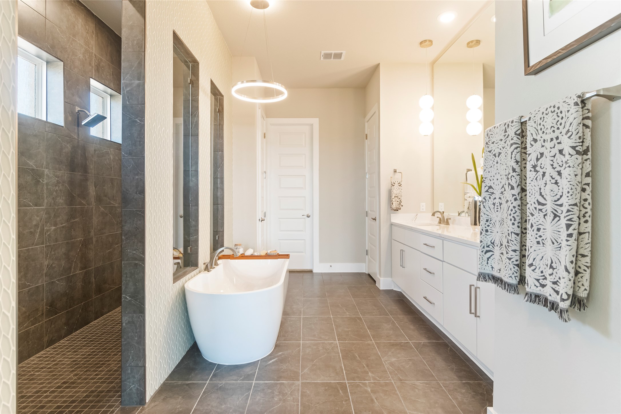 605 Crescent View Drive Georgetown, TX 78628 - Photo 14 of 39 a bathroom with a bathtub shower sink and mirror