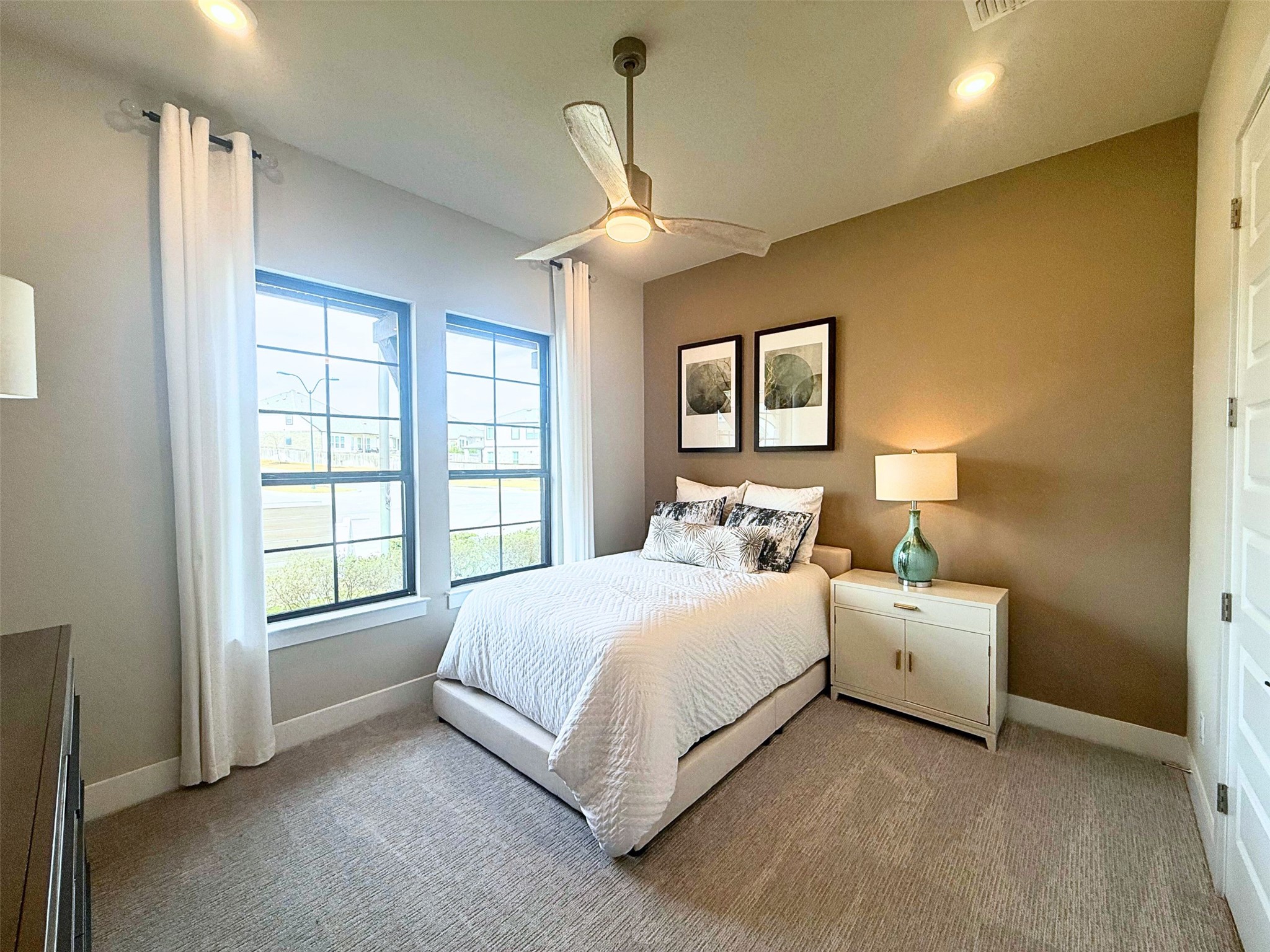 605 Crescent View Drive Georgetown, TX 78628 - Photo 20 of 39 a bedroom with a bed and a window