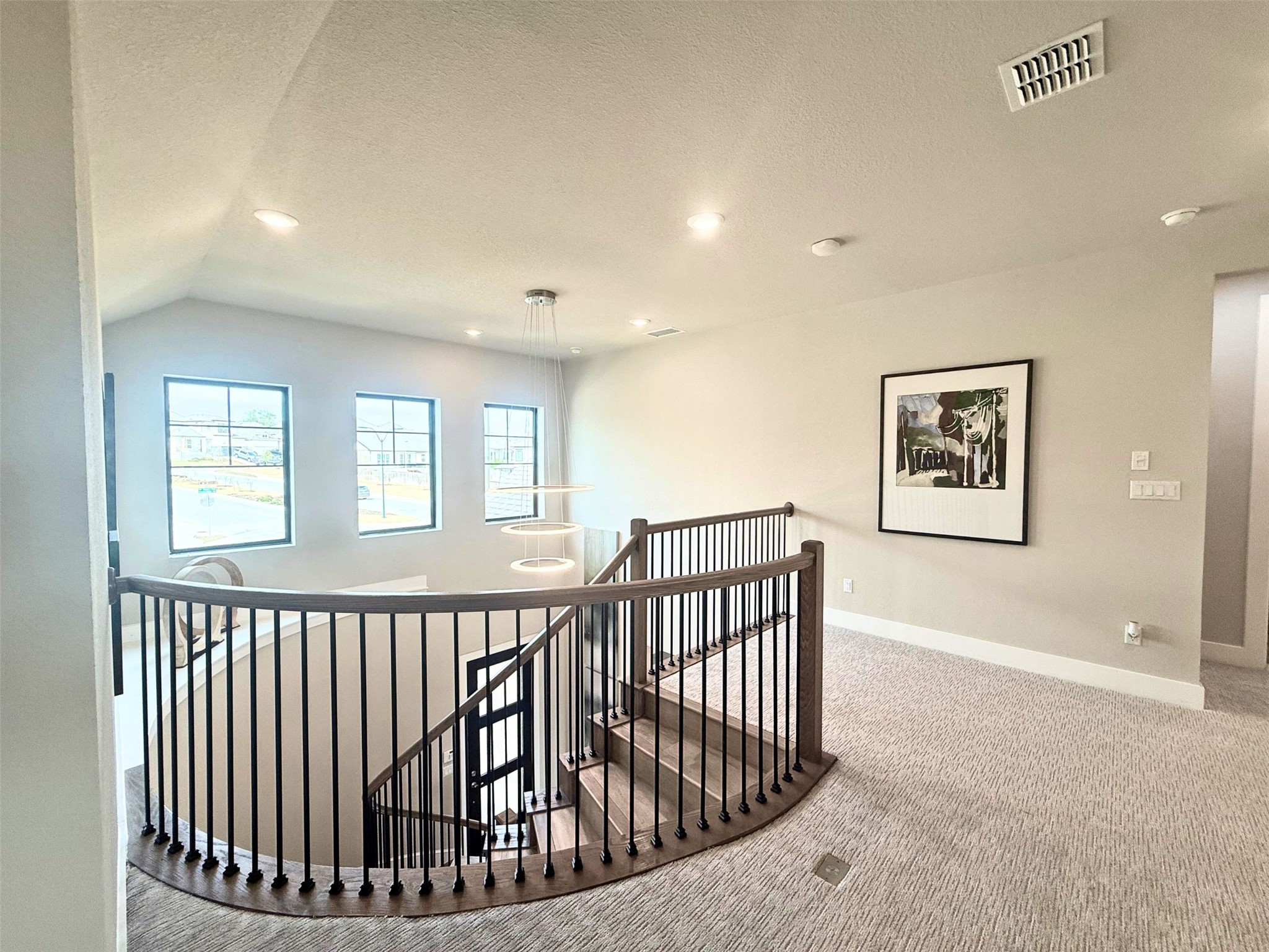 605 Crescent View Drive Georgetown, TX 78628 - Photo 22 of 39 a view of a hallway with windows