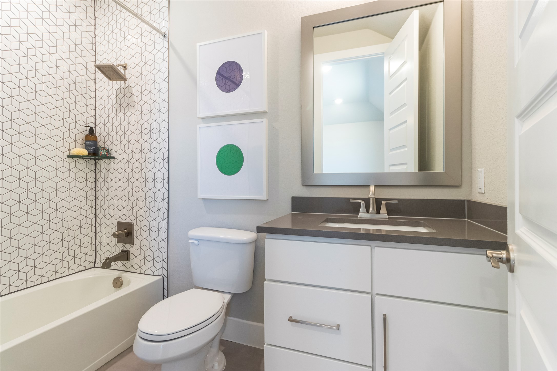 605 Crescent View Drive Georgetown, TX 78628 - Photo 31 of 39 a bathroom with a granite countertop toilet sink and mirror