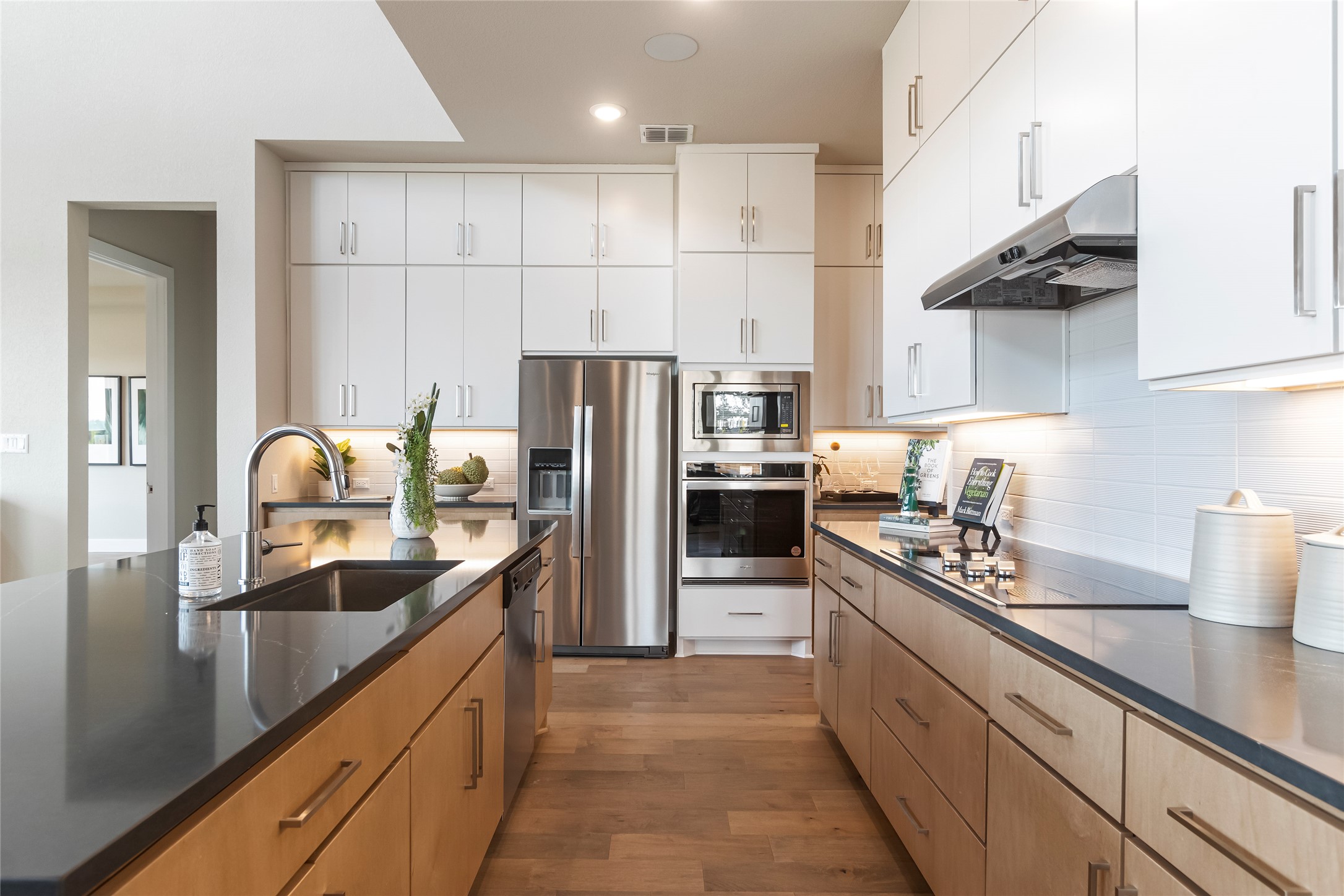 605 Crescent View Drive Georgetown, TX 78628 - Photo 10 of 39 a kitchen with stainless steel appliances a sink a stove and a refrigerator