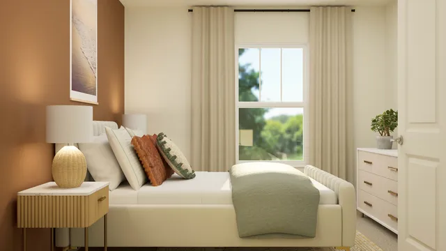 a bedroom with a bed and window