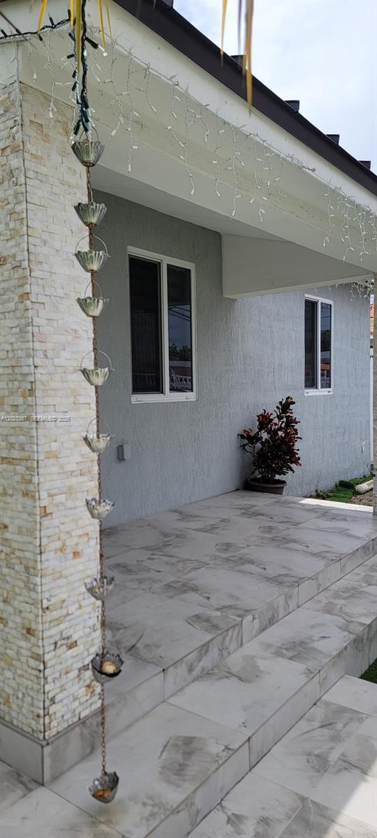 301 Southwest 36th Avenue Miami, FL 33135 - Photo 2 of 32 a front view of a house with a yard