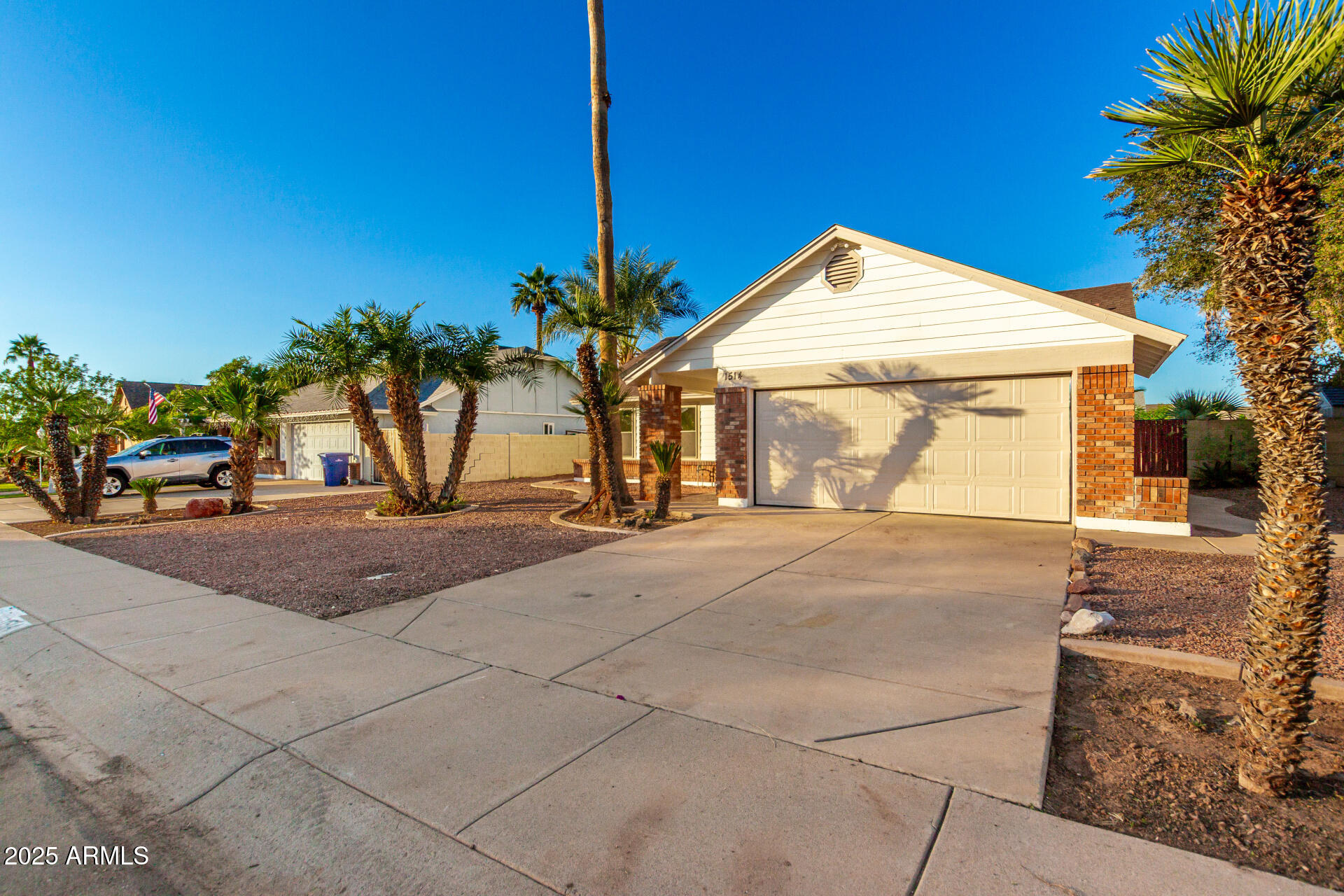 1514 West Loughlin Drive Chandler, AZ 85224 - Photo 5 of 33 a view of a street with cars
