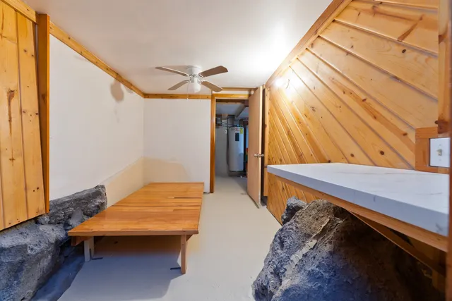 a view of an chairs and table in the balcony