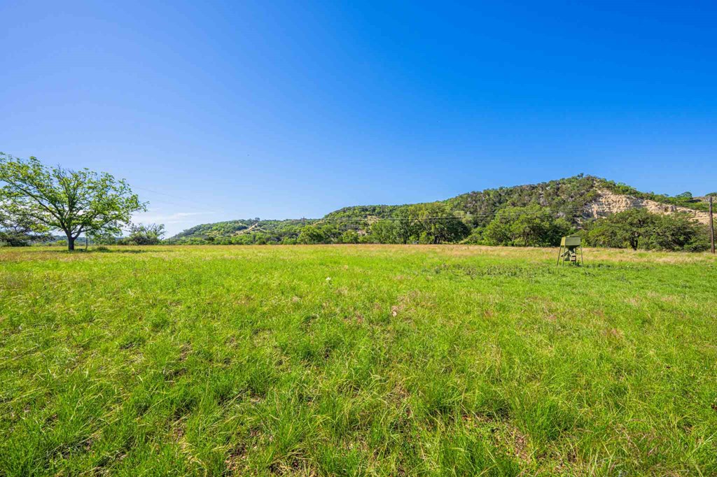 161 Flach Rnch Road Comfort, TX 78013 - Photo 23 of 69 a view of a field with an ocean