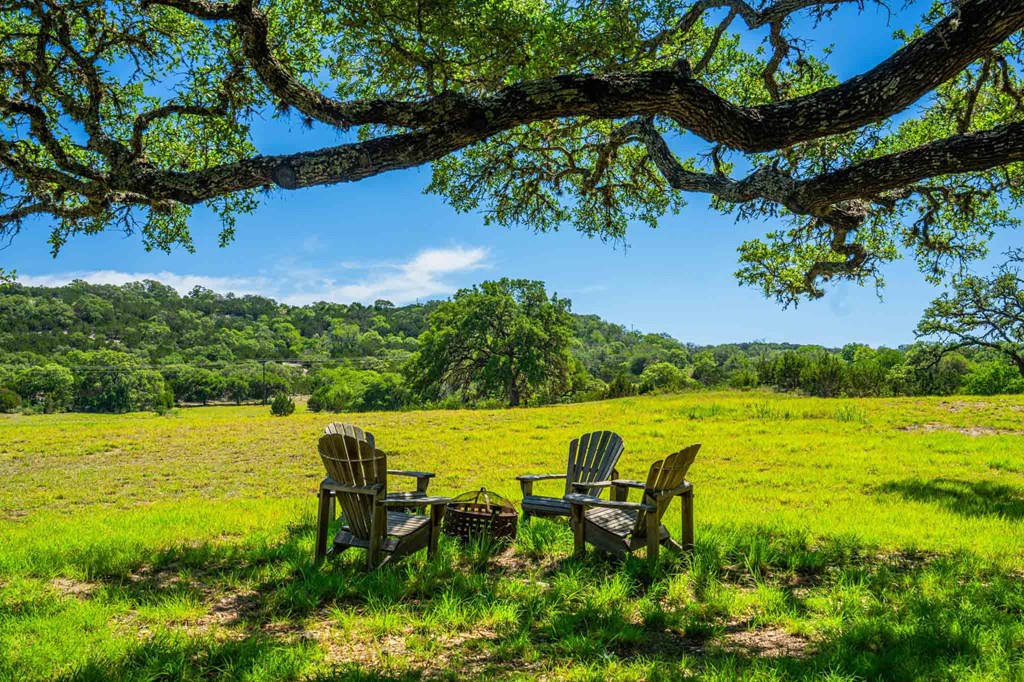 161 Flach Rnch Road Comfort, TX 78013 - Photo 3 of 69 a view of a lake with a outdoor seating