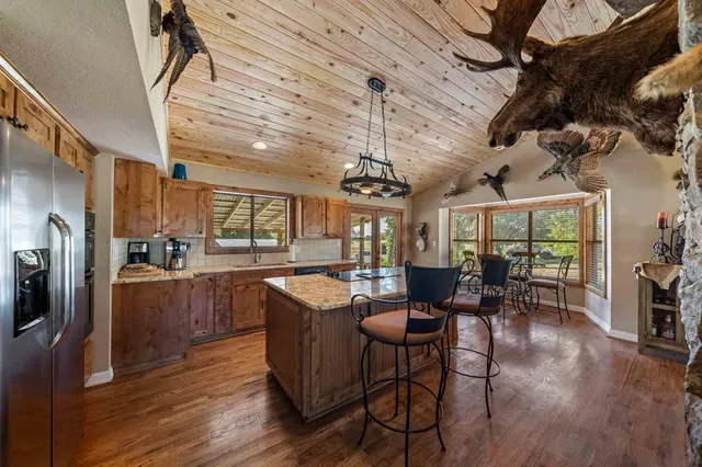 a view of a lake with a yard