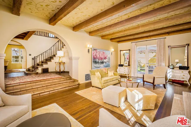 a kitchen with a stove a sink and a refrigerator