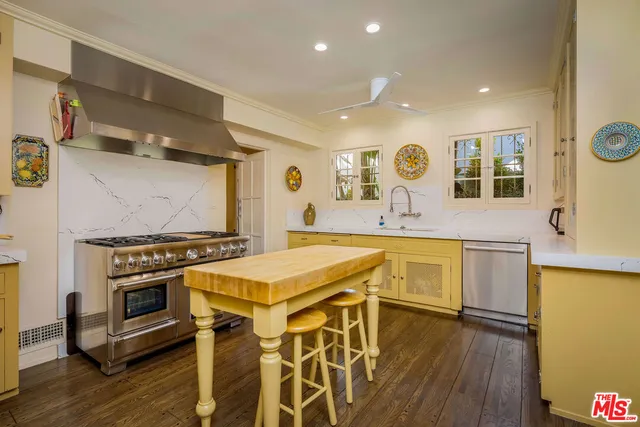 a bedroom with a bed and a fireplace