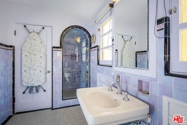 a view of a brick building with many windows