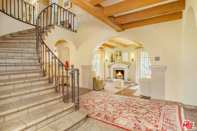 a living room with a couch and a table