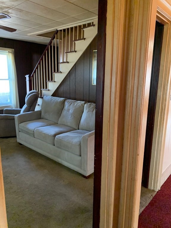 29 May Street Spencer, MA 01562 - Photo 2 of 27 a living room with furniture and a window